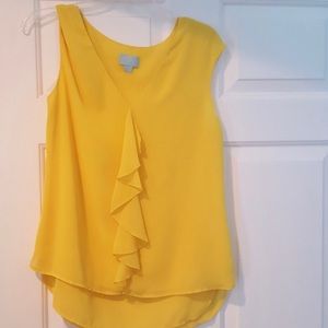 CeCe yellow ruffle top.